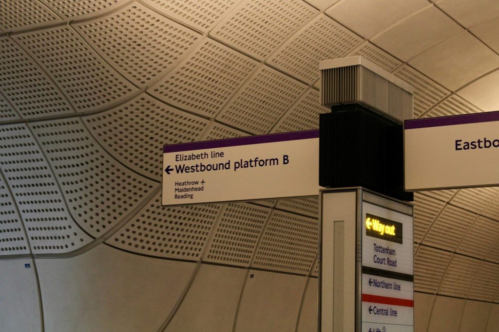 Elizabeth Line station sign showing directions for trains to Heathrow, Maidenhead and Reading
